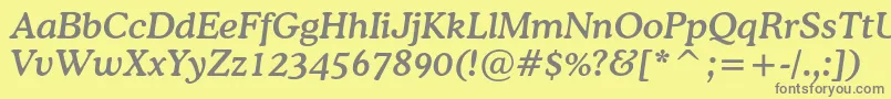 CoopermediumcbtItalic-fontti – harmaat kirjasimet keltaisella taustalla