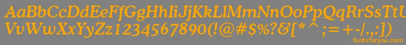 フォントCoopermediumcbtItalic – オレンジの文字は灰色の背景にあります。
