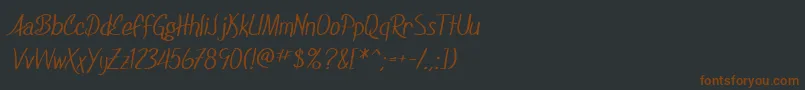 SfFoxboroScript-Schriftart – Braune Schriften auf schwarzem Hintergrund