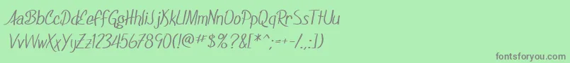 Fonte SfFoxboroScript – fontes cinzas em um fundo verde