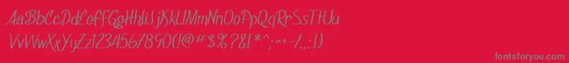 SfFoxboroScript-fontti – harmaat kirjasimet punaisella taustalla