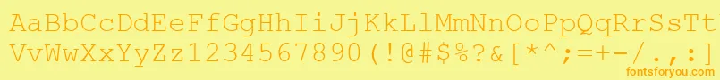 フォントCouriernew.Kz – オレンジの文字が黄色の背景にあります。