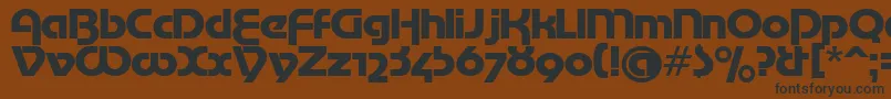 フォントMotterTekturaCyrilic – 黒い文字が茶色の背景にあります