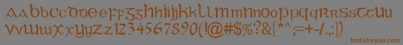 フォントCelticGaelige – 茶色の文字が灰色の背景にあります。
