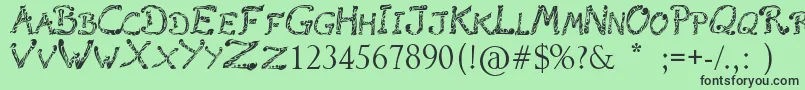 RaslaniTribal-Schriftart – Schwarze Schriften auf grünem Hintergrund