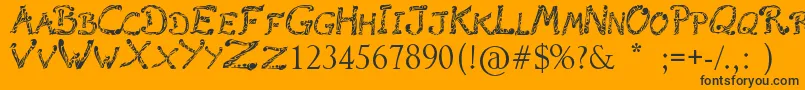 RaslaniTribal Font – Black Fonts on Orange Background