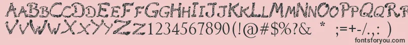 フォントRaslaniTribal – ピンクの背景に黒い文字