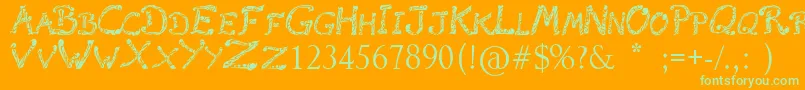 RaslaniTribal Font – Green Fonts on Orange Background