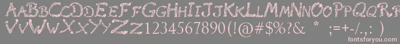 RaslaniTribal Font – Pink Fonts on Gray Background