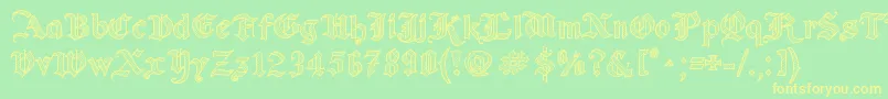 フォントOldWiseSketch – 黄色の文字が緑の背景にあります