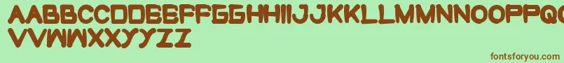 CuteMonster Font – Brown Fonts on Green Background