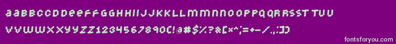 Strongdots-Schriftart – Grüne Schriften auf violettem Hintergrund