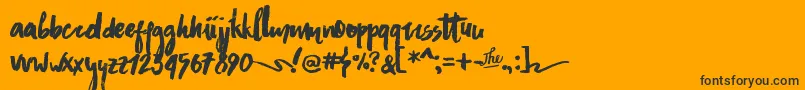 AsphaltsBrushPersonalUse Font – Black Fonts on Orange Background