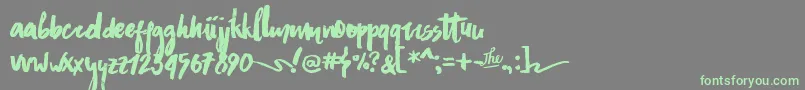 AsphaltsBrushPersonalUse Font – Green Fonts on Gray Background