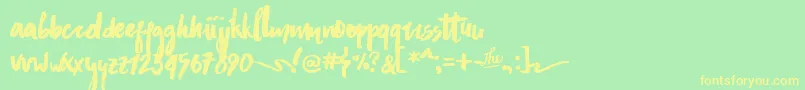 AsphaltsBrushPersonalUse Font – Yellow Fonts on Green Background