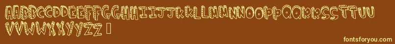 Climbtheladder Font – Yellow Fonts on Brown Background