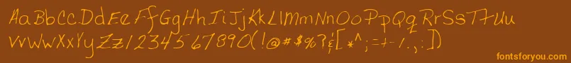 TerfontRegular Font – Orange Fonts on Brown Background