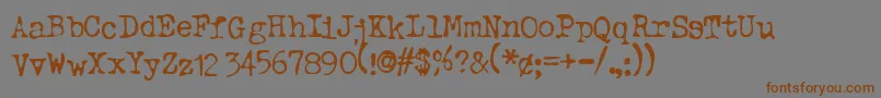 Typeo ffy-Schriftart – Braune Schriften auf grauem Hintergrund