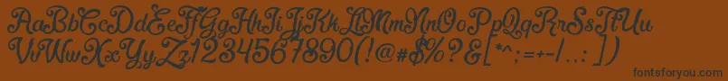 フォントFadliScript – 黒い文字が茶色の背景にあります