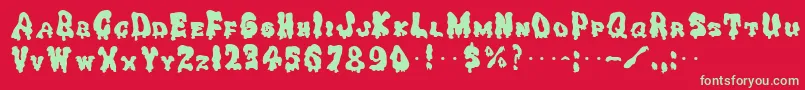 GhoulysolidRegular Font – Green Fonts on Red Background