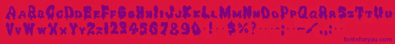 GhoulysolidRegular Font – Purple Fonts on Red Background