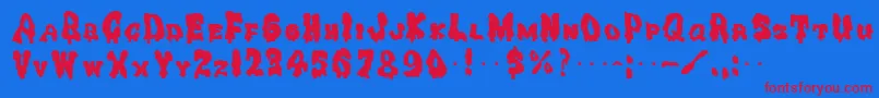 GhoulysolidRegular Font – Red Fonts on Blue Background