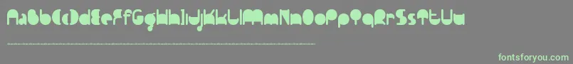 フォントFtpedantdemo – 灰色の背景に緑のフォント