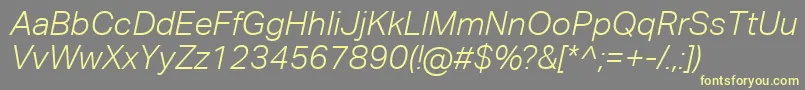 AktivgroteskcorpLightitalic-fontti – keltaiset fontit harmaalla taustalla