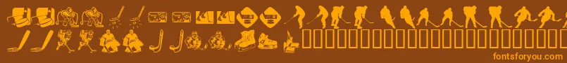 KrHockeyDings-Schriftart – Orangefarbene Schriften auf braunem Hintergrund