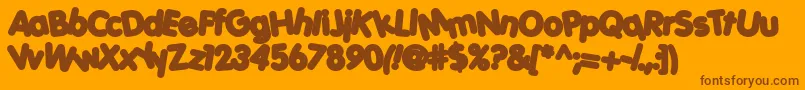 Porkh-Schriftart – Braune Schriften auf orangefarbenem Hintergrund
