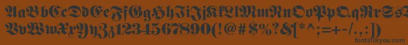 Fetteclassicunzfraktur-Schriftart – Schwarze Schriften auf braunem Hintergrund