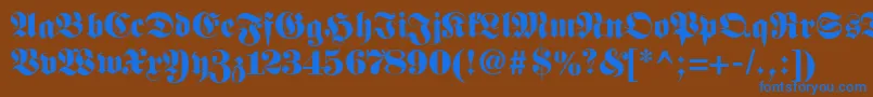 Fetteclassicunzfraktur-Schriftart – Blaue Schriften auf braunem Hintergrund