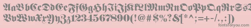 Fonte Fetteclassicunzfraktur – fontes cinzas em um fundo rosa