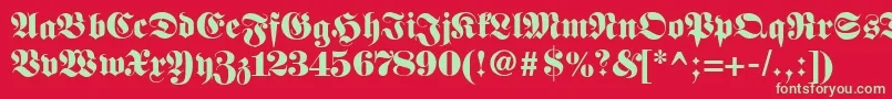 フォントFetteclassicunzfraktur – 赤い背景に緑の文字