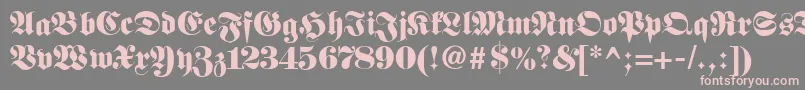 Fetteclassicunzfraktur-Schriftart – Rosa Schriften auf grauem Hintergrund