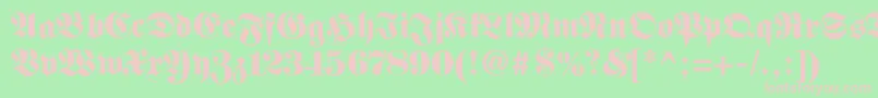フォントFetteclassicunzfraktur – 緑の背景にピンクのフォント