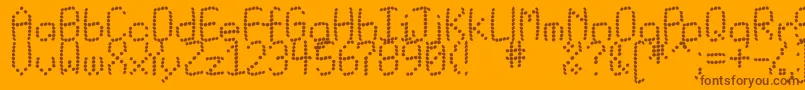 Matrixbuk Font – Brown Fonts on Orange Background