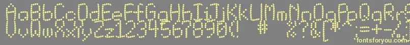 Matrixbuk Font – Yellow Fonts on Gray Background
