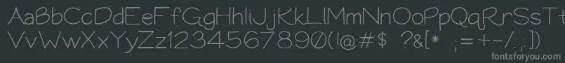 フォントBookworm062308 – 黒い背景に灰色の文字
