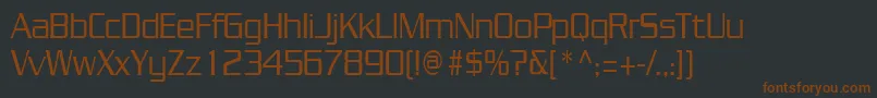 Шрифт JuliuscondensedRegular – коричневые шрифты на чёрном фоне