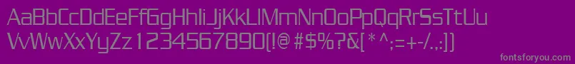 フォントJuliuscondensedRegular – 紫の背景に灰色の文字