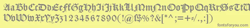 Dscaslongotisch Font – Gray Fonts on Yellow Background