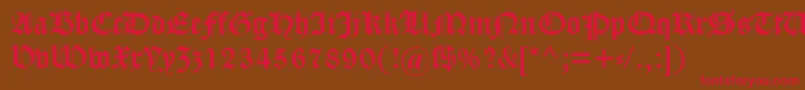 フォントDscaslongotisch – 赤い文字が茶色の背景にあります。