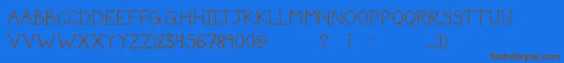 CuteTattoo Font – Brown Fonts on Blue Background