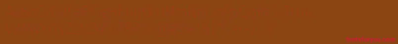 FirasanscondensedEight-Schriftart – Rote Schriften auf braunem Hintergrund