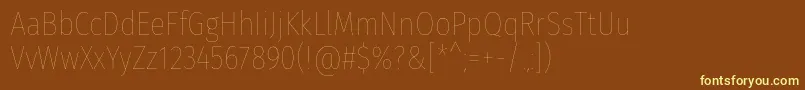 FirasanscondensedEight-fontti – keltaiset fontit ruskealla taustalla