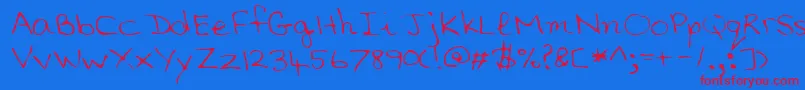 SaddleRegular-Schriftart – Rote Schriften auf blauem Hintergrund