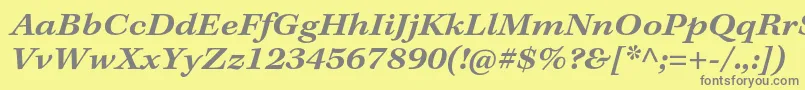 フォントKeplerstdSemiboldextitcapt – 黄色の背景に灰色の文字