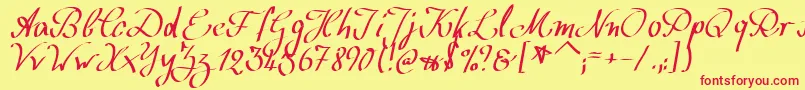 フォントWolgastScript – 赤い文字の黄色い背景