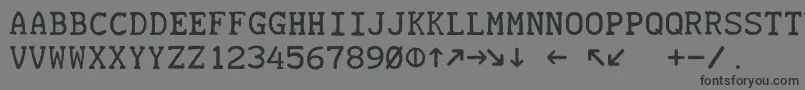 フォントTeletype19451985 – 黒い文字の灰色の背景